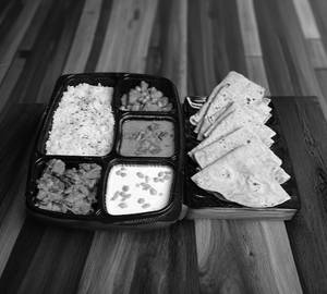 Rice + Roti + Mix Veg + Aloo Mattar Thali