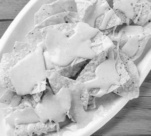 Cheesy delight nachos( with cheese DIP)