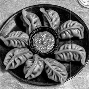 Soya Dip Fry Schezwan Cheese Momo