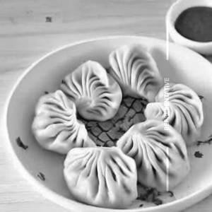 Paneer afghani malai momo
