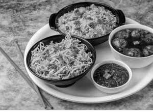 Veg Fried Rice + Veg Hakka Noodles + Veg Manchurian Gravy (4pcs)