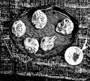 Veg afghani malai momos
