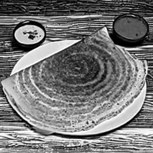 Schezwan Butter Cheese Masala Dosa