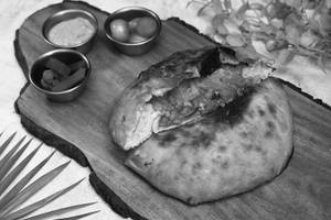 Amritsari Chole Stuffed Parantha (woodfired)