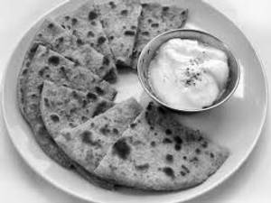 Aloo paratha with curd