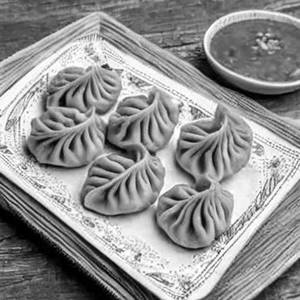 Spacial Afgani Momo