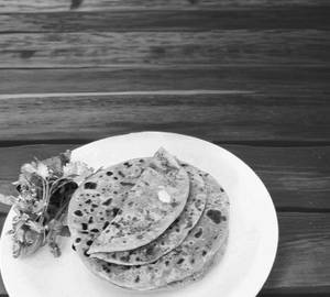 Namak Mirch Paratha  with creamy curd Spicy Green Mirchi Achar