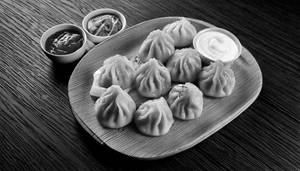 Veg momos steamed [8 pieces]