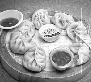 Chicken cheese steamed momos