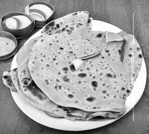 Aloo pyaj parantha tawa
