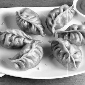 Veg Fried Momos (8 Pieces )