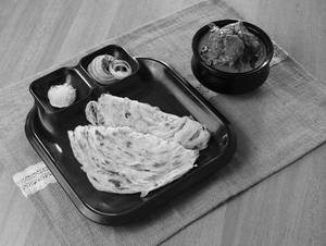 2 Porotta + Chicken Curry