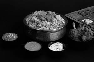 Boneless Mutton Biryani + Chicken Lollypop (3 Pcs)