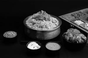 Boneless Mutton Biryani + Chicken 65 (4 Pcs)