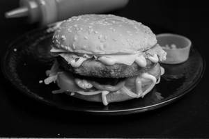 Spicy Schezwan Aloo Tikki Burger
