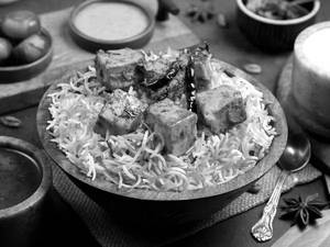 Paneer Tikka  Biryani With Raita