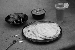 Parotta(6)+chicken Kurma &gravy+chicken 65/lollipop+soft Drink