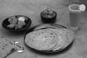 Wheat Parotta(6)+pepper Chicken & Gravy+chicken 65/lollipop+soft Drink