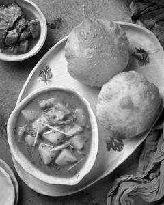 Aloo Sabzi With Poori And Pickle