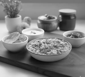 Khichdi With Dahi Papad And Aachar