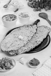 Butter Paneer Masala & Boondi Raita with 2 Garlic Naan