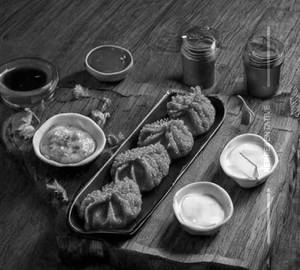 Chicken cheese pan fried momo