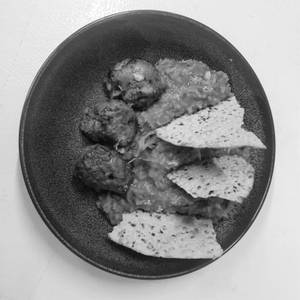 Black Dal Khichdi with Chicken Tikka