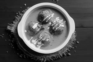 Veg. Kofta (Yellow Gravy)