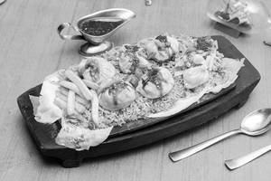 Sizzling Veg Momo Sizzler