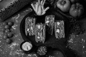 Paneer Tandoori Double-decker Club Sandwich In Jumbo Bread