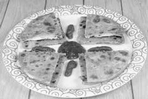 Paneer paratha with curd and pickle