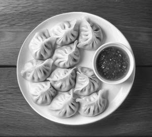 Chicken Stream Momos ( 8 Pcs )