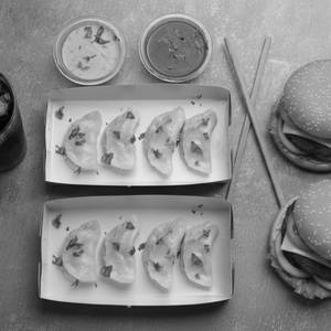 Chicken Cheese Steamed Momos Mania Combo (8Pc Momos + 2 Burgers)