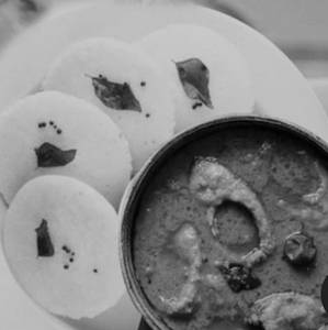 Idly With Fish Curry