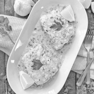 Fish In White Garlic Sauce