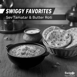 Sev Tamatar (150ml) + 2 Tawa Roti Butter + Salad