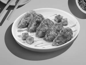 Paneer Pan-tossed Momos