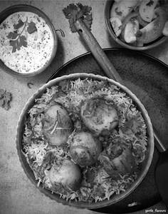 Egg Dum Biryani With Raita