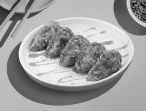 Veg Schezwan Pan-tossed Momos