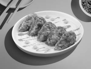 Cheese & Corn Pan-tossed Momos