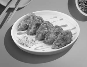 Chicken Cheese Pan-tossed Momos