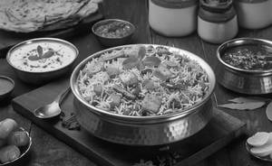 Veg Biryani With Raita/gravy