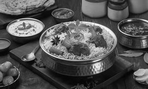 Mutton Biryani With Raita/gravy