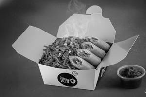 Schezwan Noodles With Vegetable Spring Roll