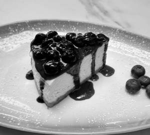 Cheesecake With Fresh Berry Compote And Berries