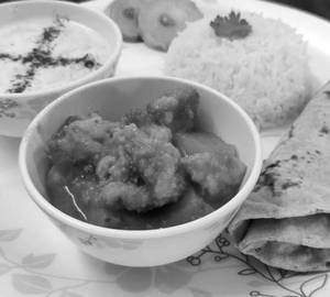 Basmati Rice With Marwadi Moong Matar Wadi With 1 Nos. Roasted Papad.