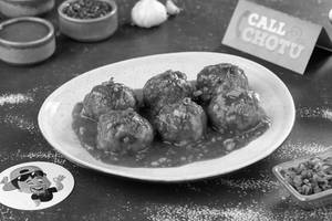 Hot Garlic Tossed Saucy Momos