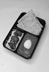 2pcs Chappati + Egg Masala + Chicken-65 (3pcs)