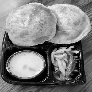 Puri Bhujia Kheer ( 04 plain Puri, Aloo Bhujia and Kheer)