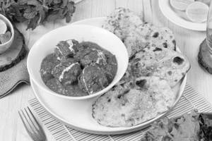 Chicken tikka ala kiev with peri peri garlic naan